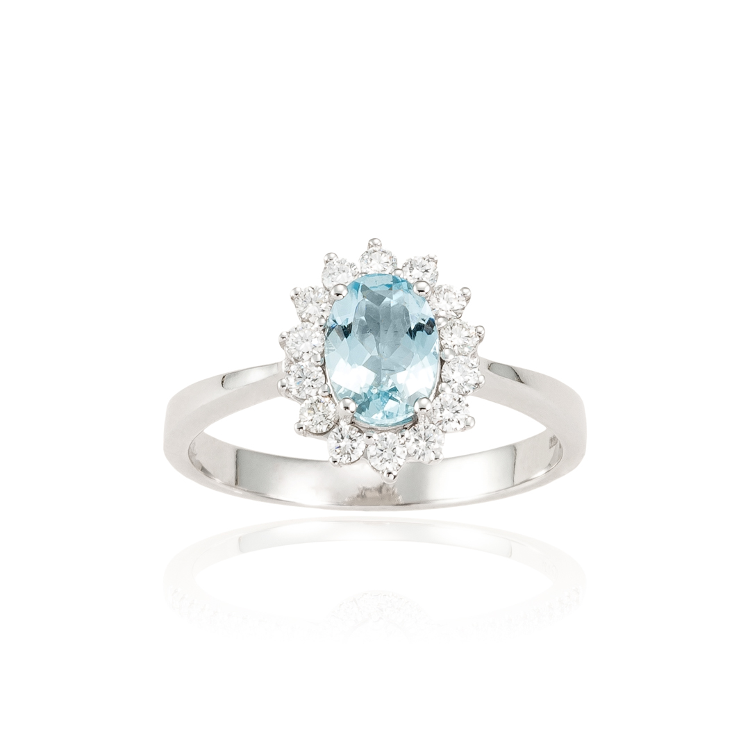 Anillo oro blanco con aguamarina ovalada y orla floral de diamantes oro 1 Anillo oro blanco con aguamarina ovalada y orla floral de diamantes oro