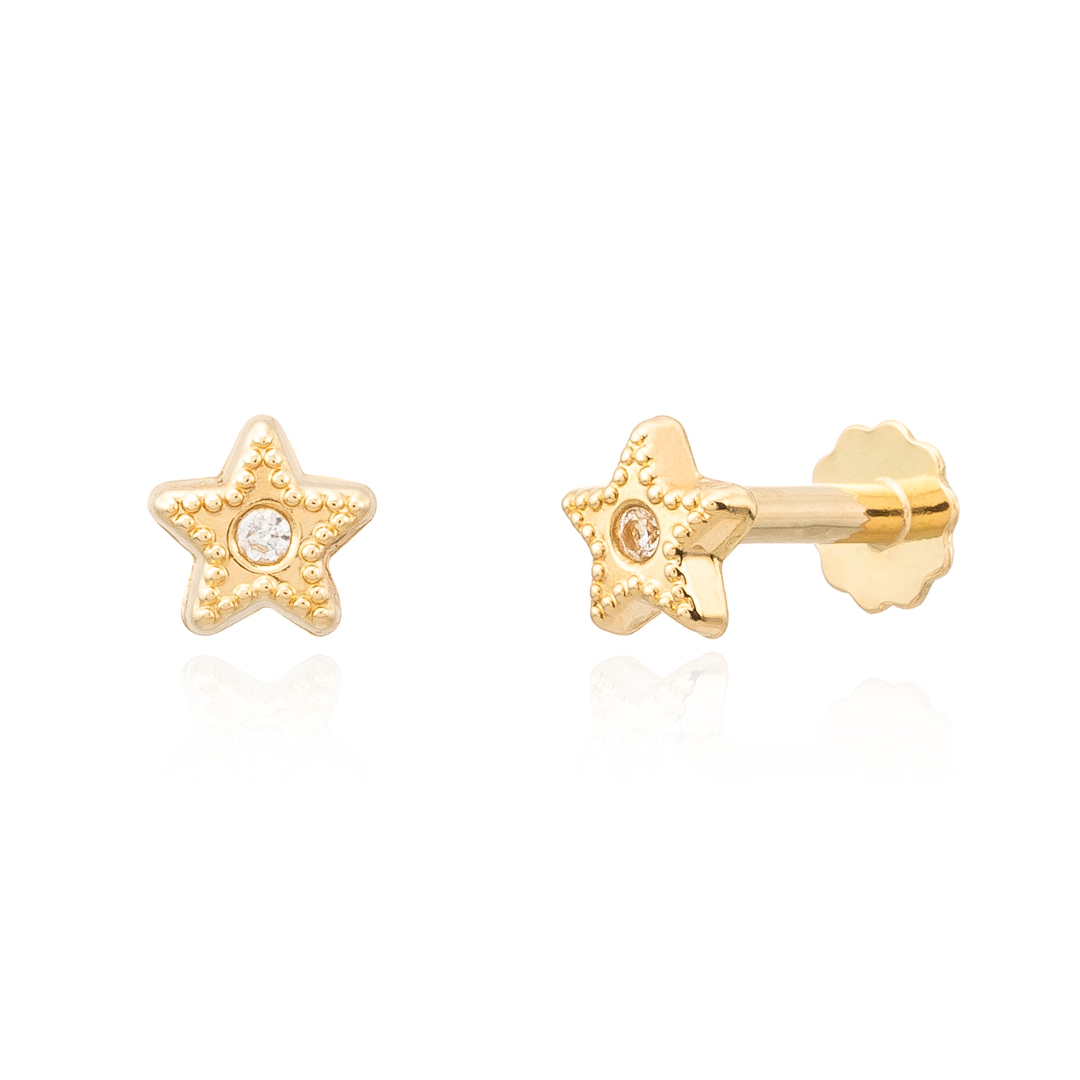 Piercing tragus oro 1 Piercing tragus oro